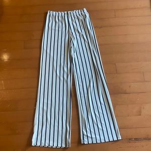 Brand new white pants with black stripes!